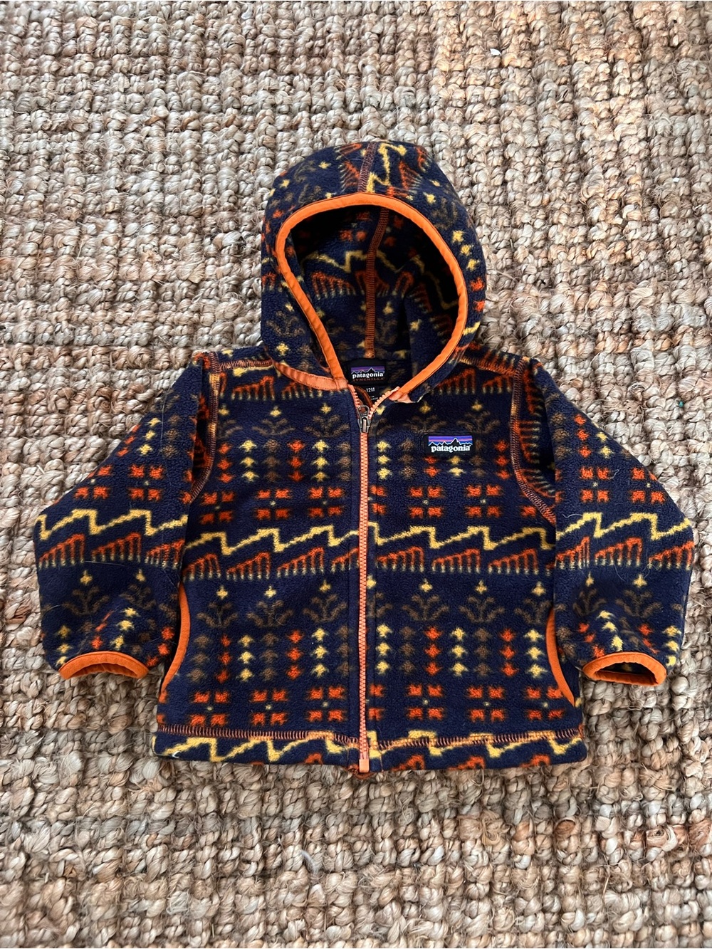 Patagonia Kids Navy Hooded Fleece Jacket with Orange & Yellow Accents